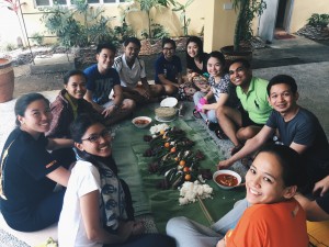 AHRC Interns taking part in a Boodle Fight