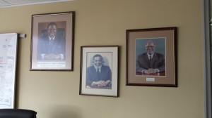 Pictures of Namibia's three Presidents hang in the boardroom of the Law Reform and Development Commission. President Hage Geingob is pictured on the left.