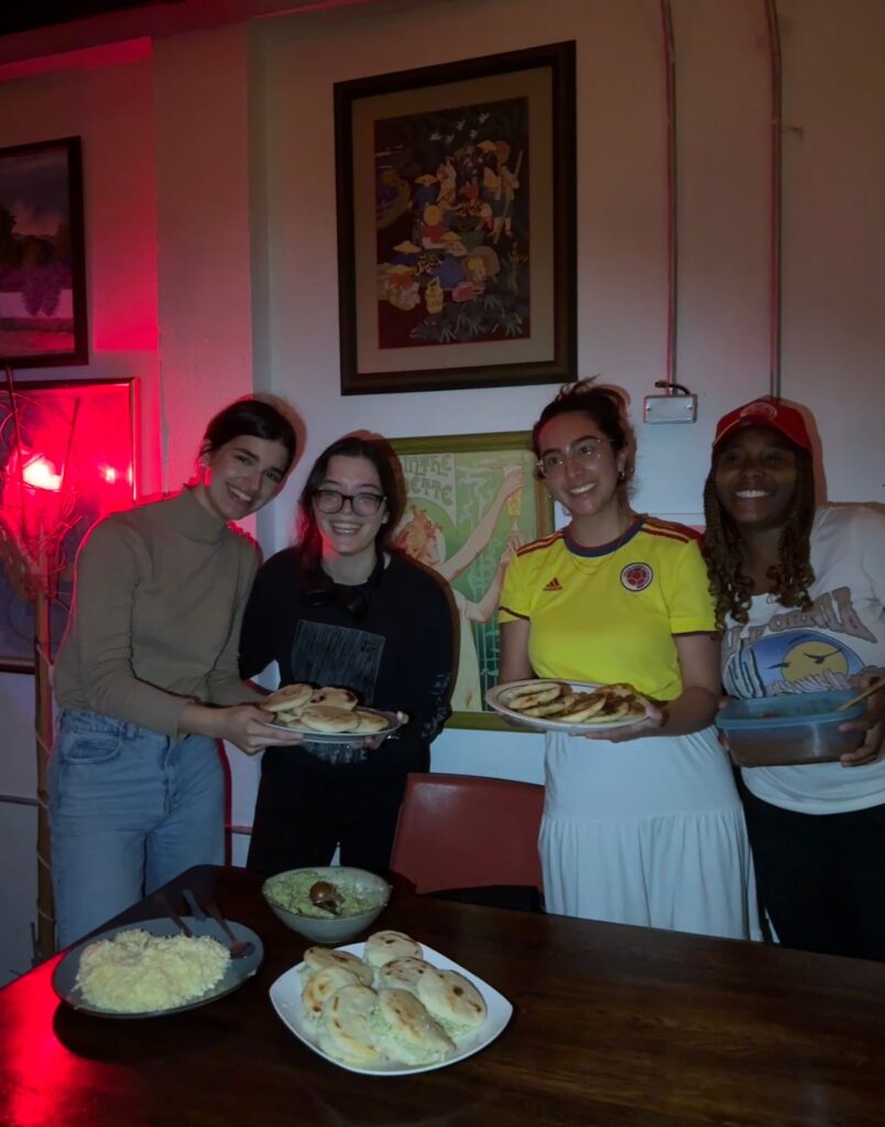 From left to right: Romina, Ellis, me and, Gabriela holding our respective arepas