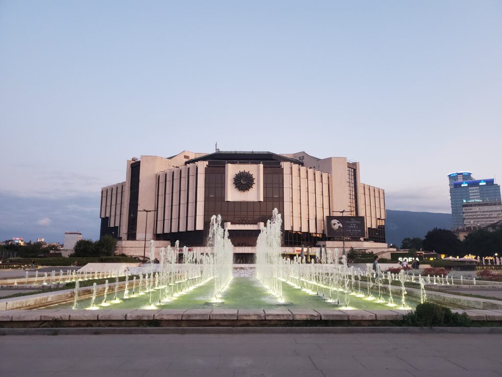 Sofia's National Palace of Culture: a large brutalist building with fountains in front.